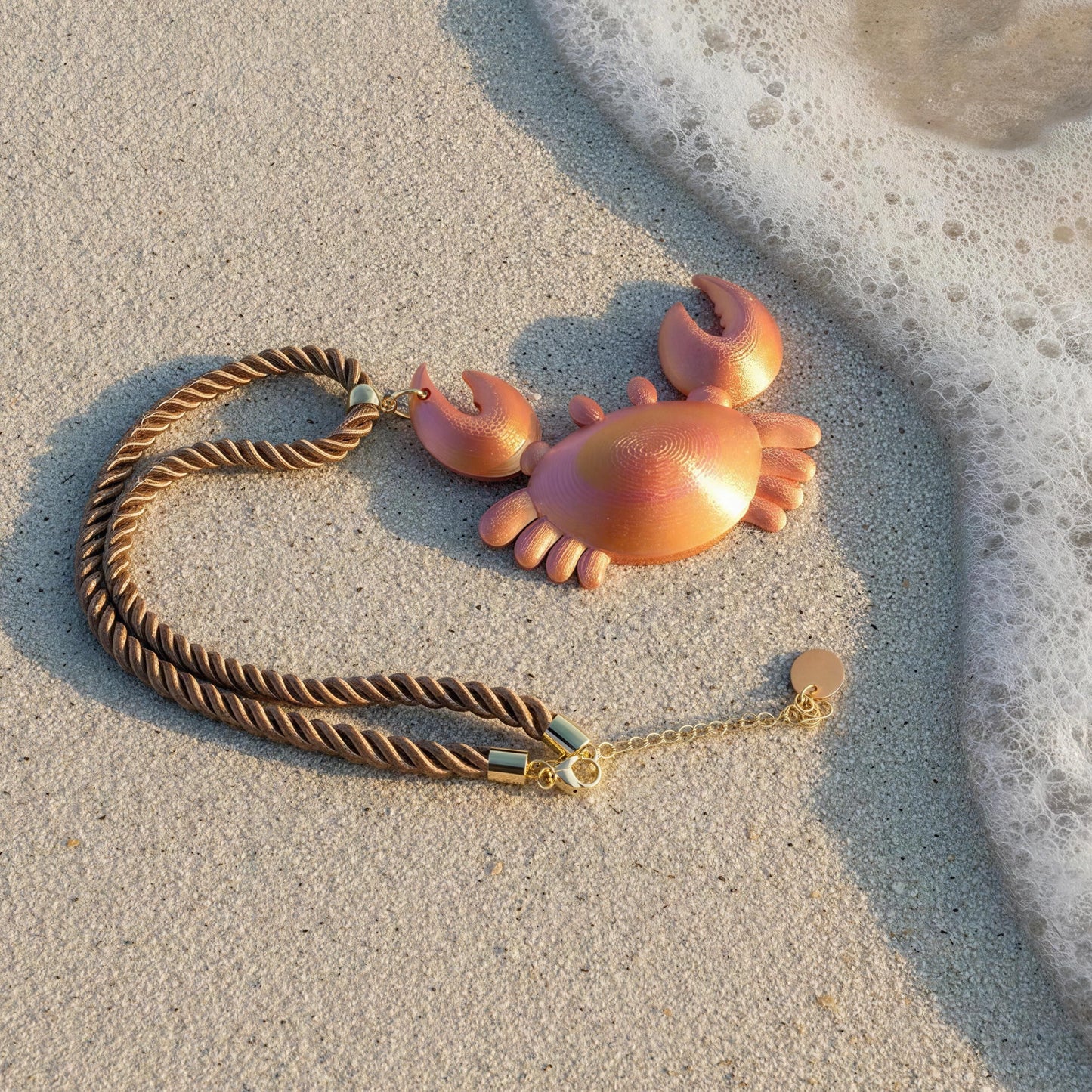 The Granchio Necklace from Chica Chica Jewelry by beach seafoam.