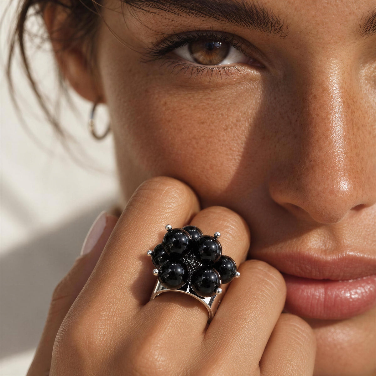 Close up photo of model wearing the Sabina Ring from Chica Chica Jewelry. 