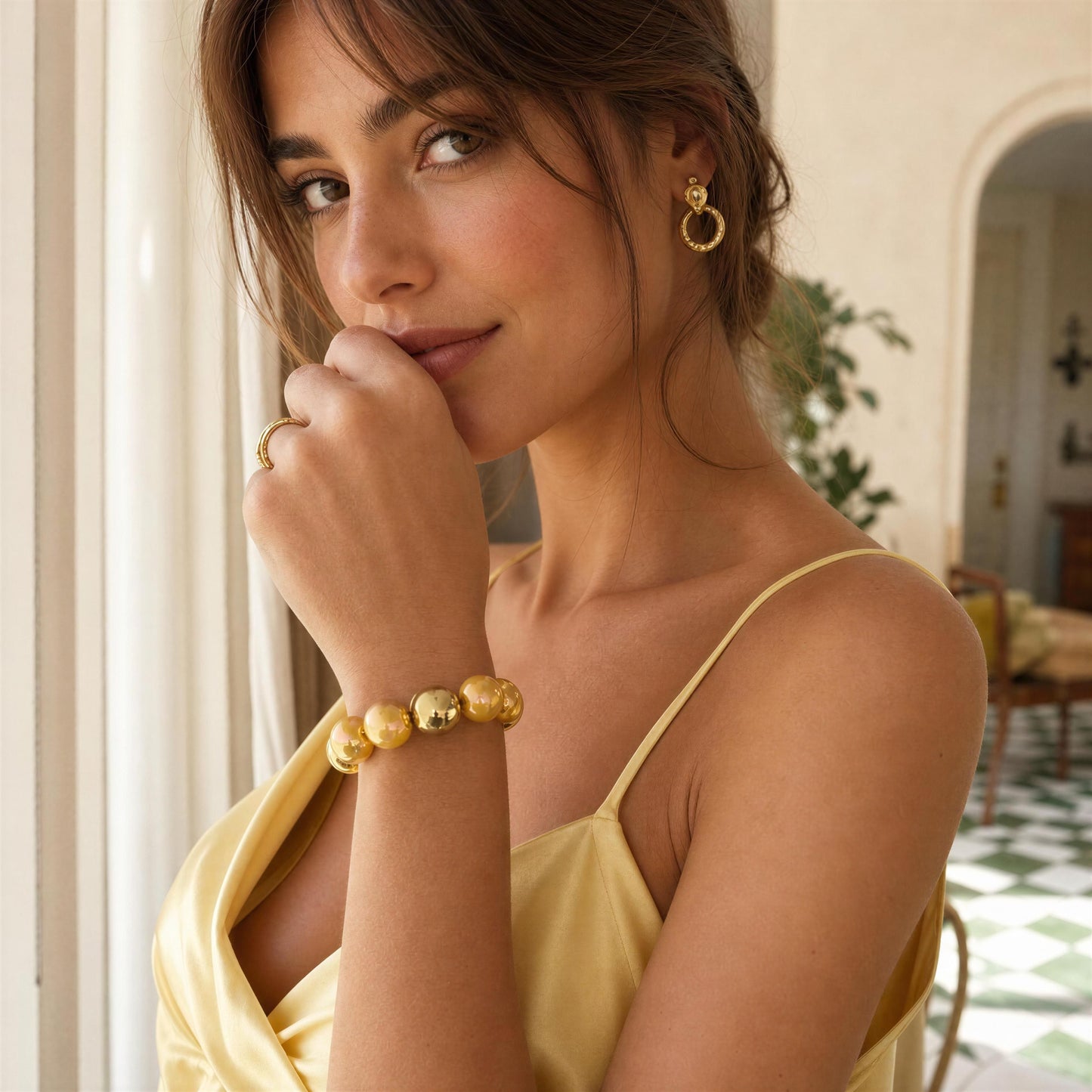 Model wearing the Banana Glow Bracelet from Chica Chica Jewelry