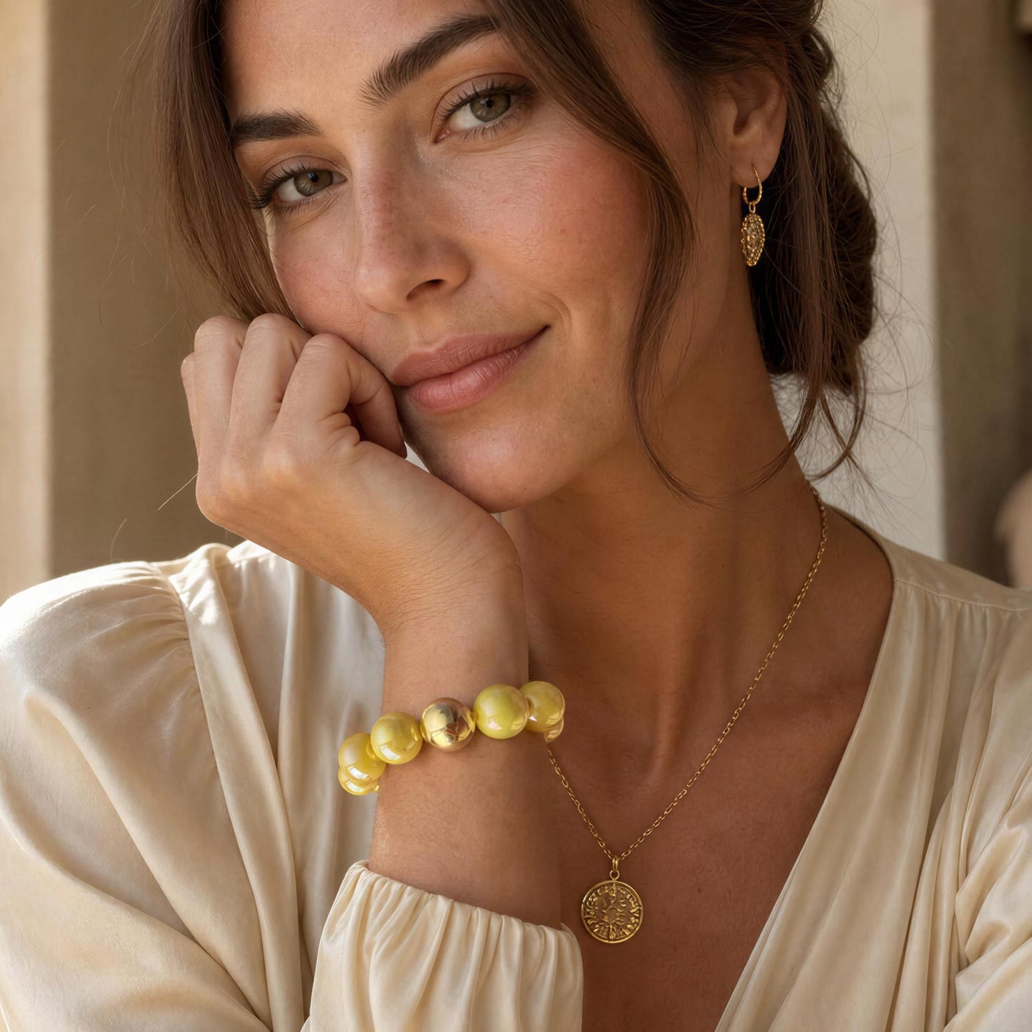 Woman wearing the Banana Glow Bracelet  indoors