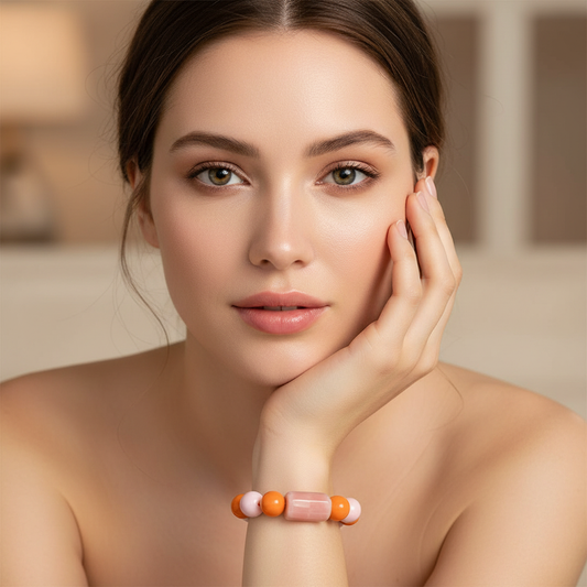 Woman wearing  the Blush & Citrus Color Pop Bracelet with a blurred background