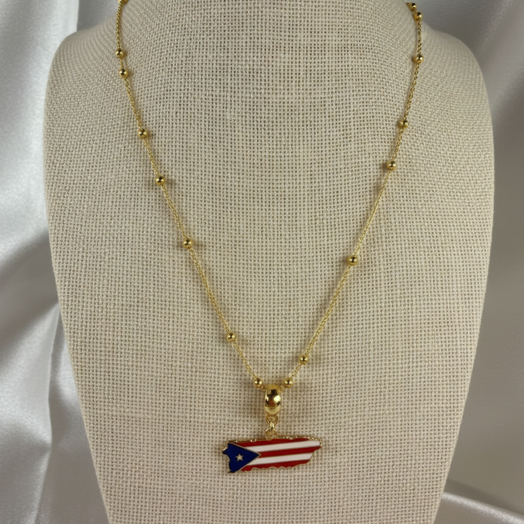 Gold necklace with a Puerto Rican flag pendant on a beige mannequin bust.
