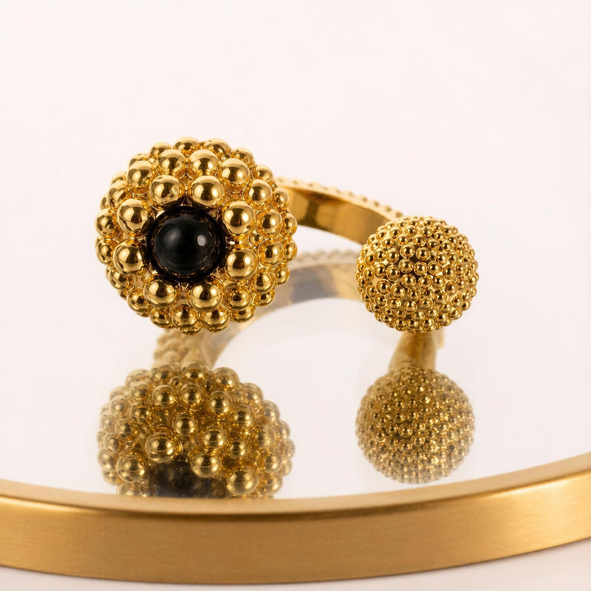 The Chica Chica Jewelry , Nero Ring  on reflective mirror 