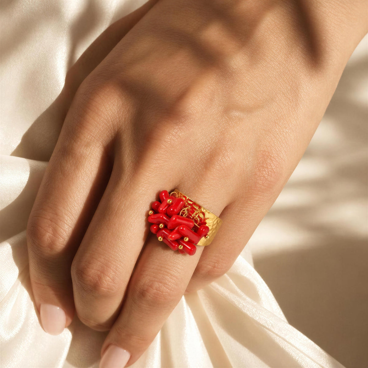 Model wearing the Coral Ember Ring from Chica Chica Jewelry.