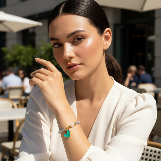 Model at outdoor cafe wearing  the Endless Promise Mint Heart Bracelet_Chica Chica Jewelry