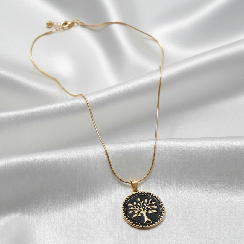Eternal Tree Black Medallion Necklace  with a black pendant on a white satin background