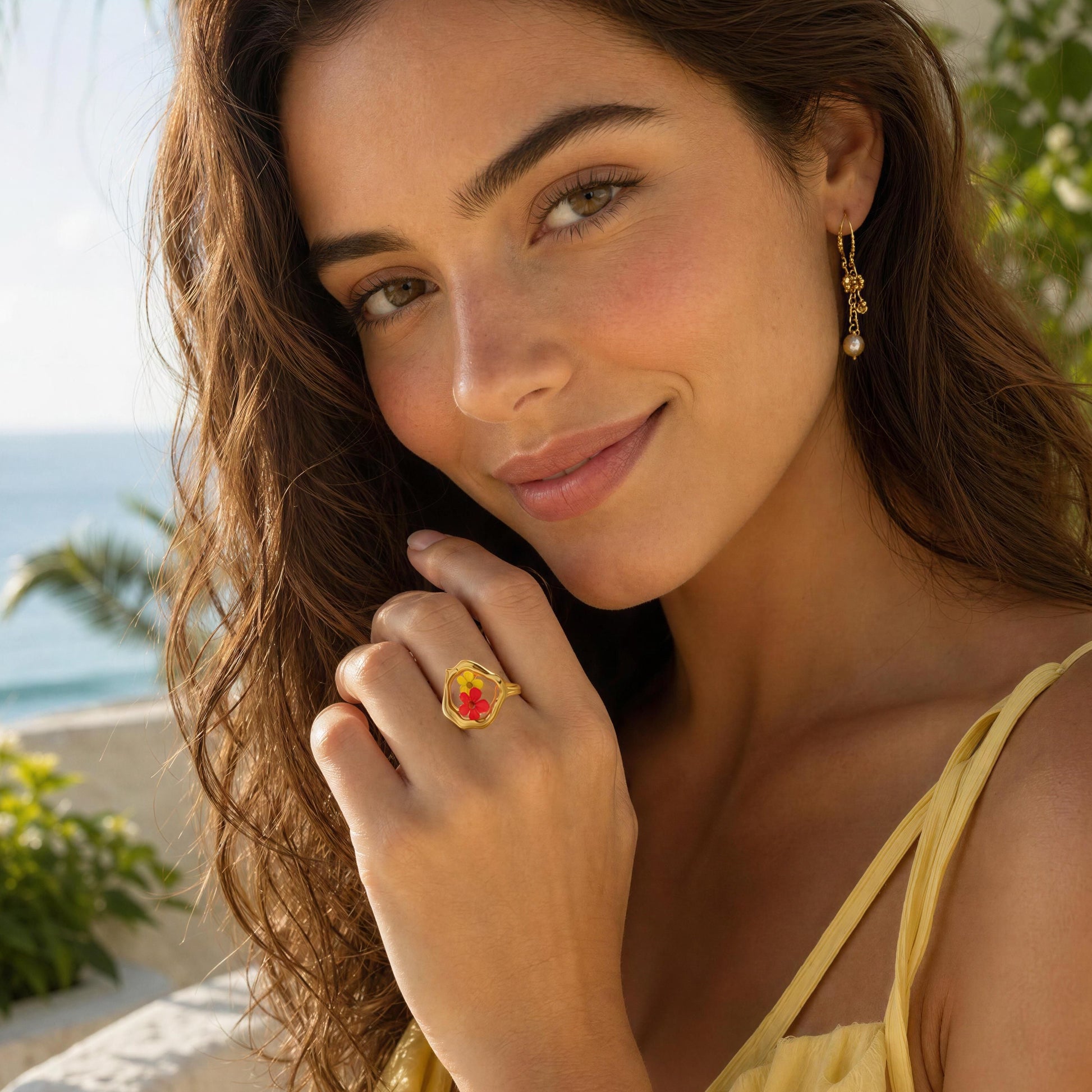 Woman with the Fiore Ring  outdoors by the ocean