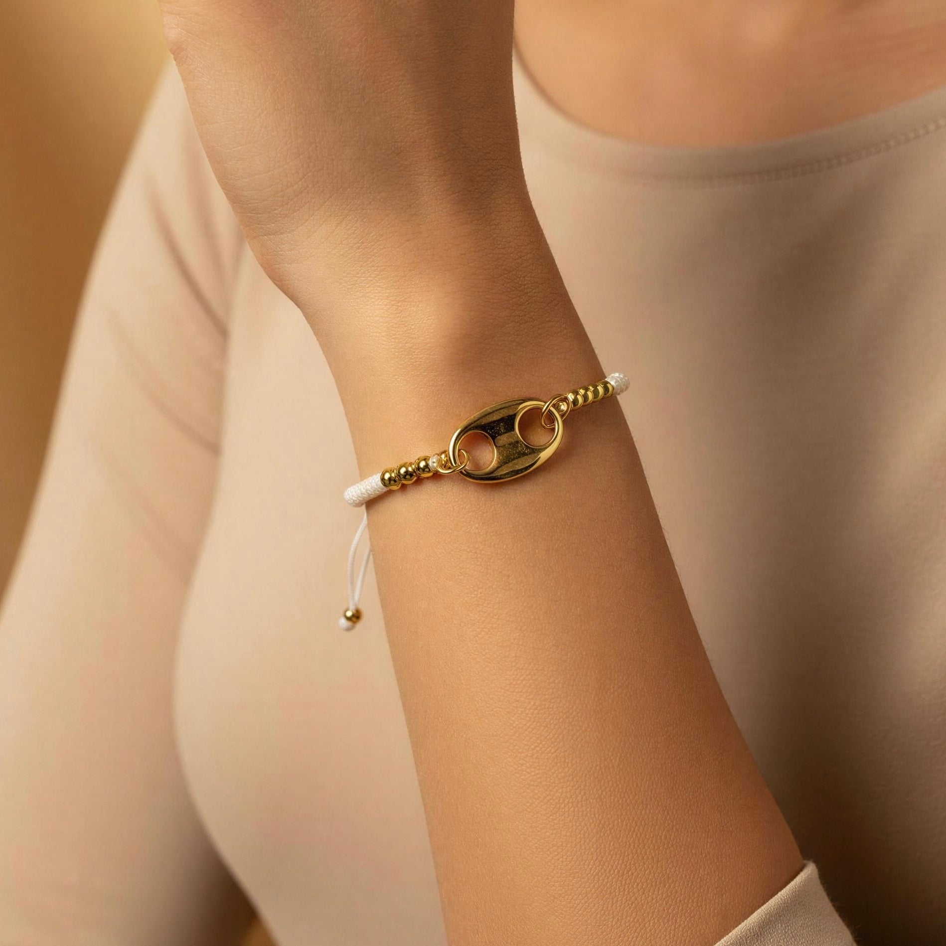 The Nexo Bracelet – White on a wrist with a neutral background