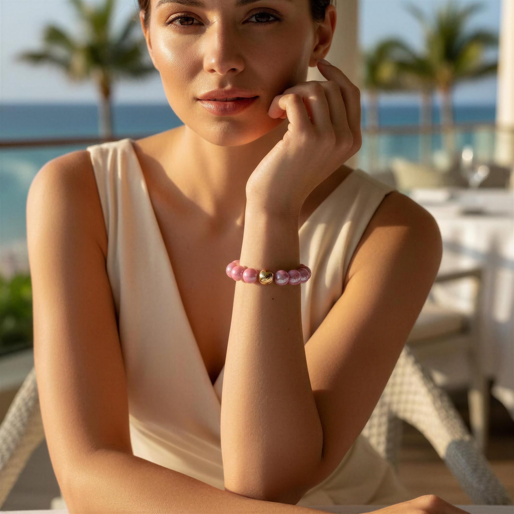 Woman wearing the Orchid Glow Bracelet with a scenic background