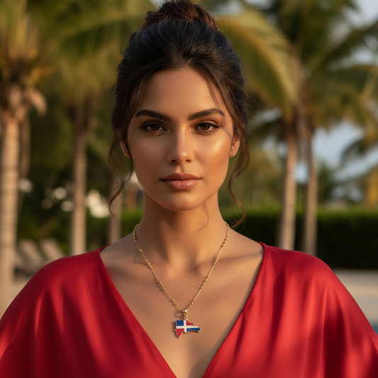 Woman wearing a red dress with the Quisqueya Necklace featuring the Dominican Republic flag pendant, palm trees in the background.