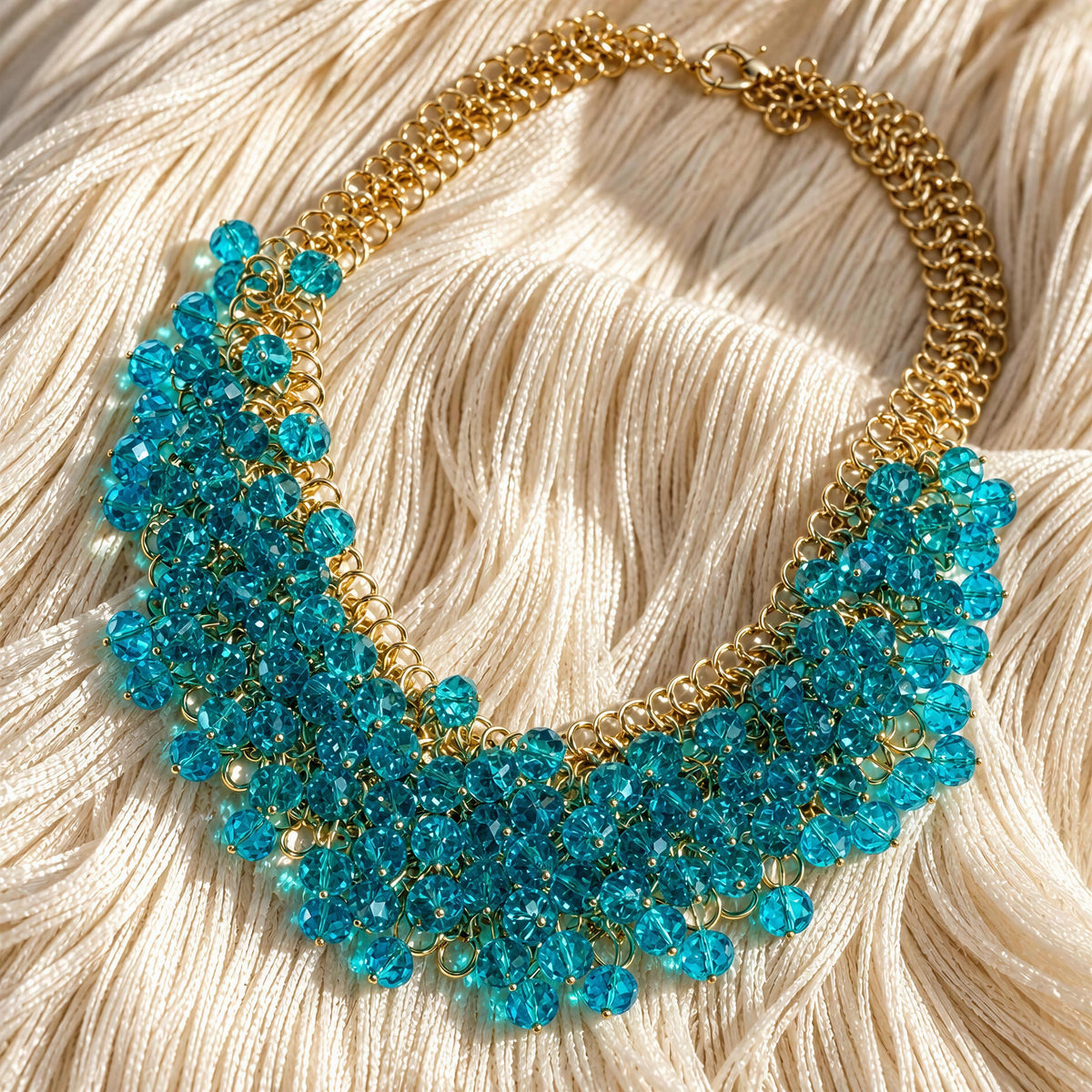 The Azzurra Necklace- Riviera Collection
From Chica Chica Jewelry against a crème color fringes fabric. 