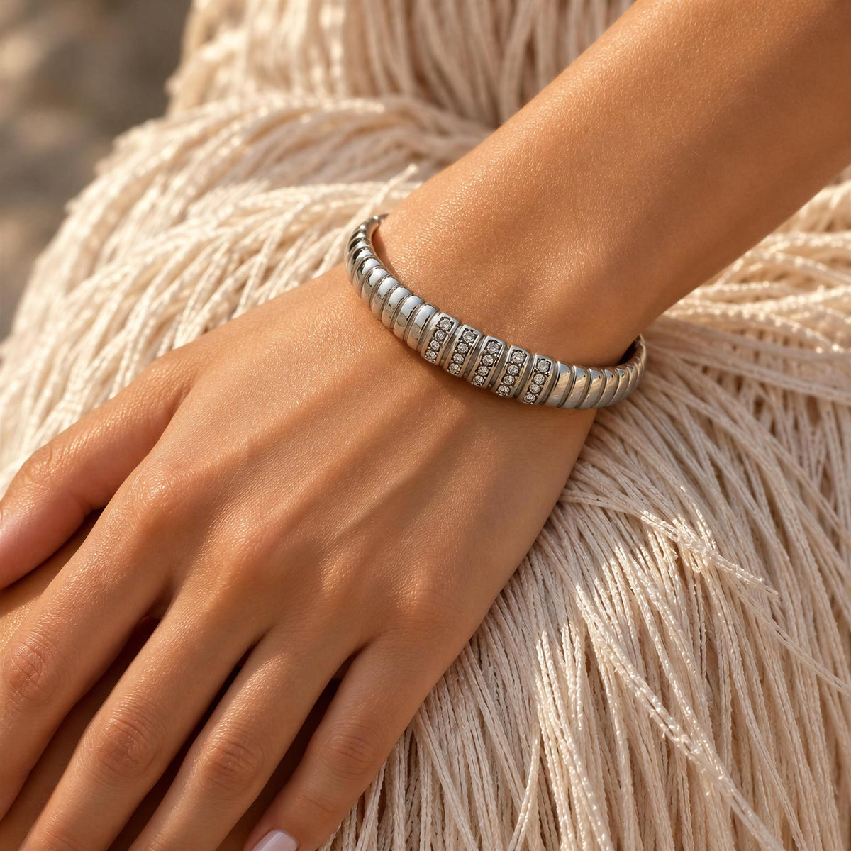 Model hand wearing the Alessia Bangle from  Chica Chica Jewelry 