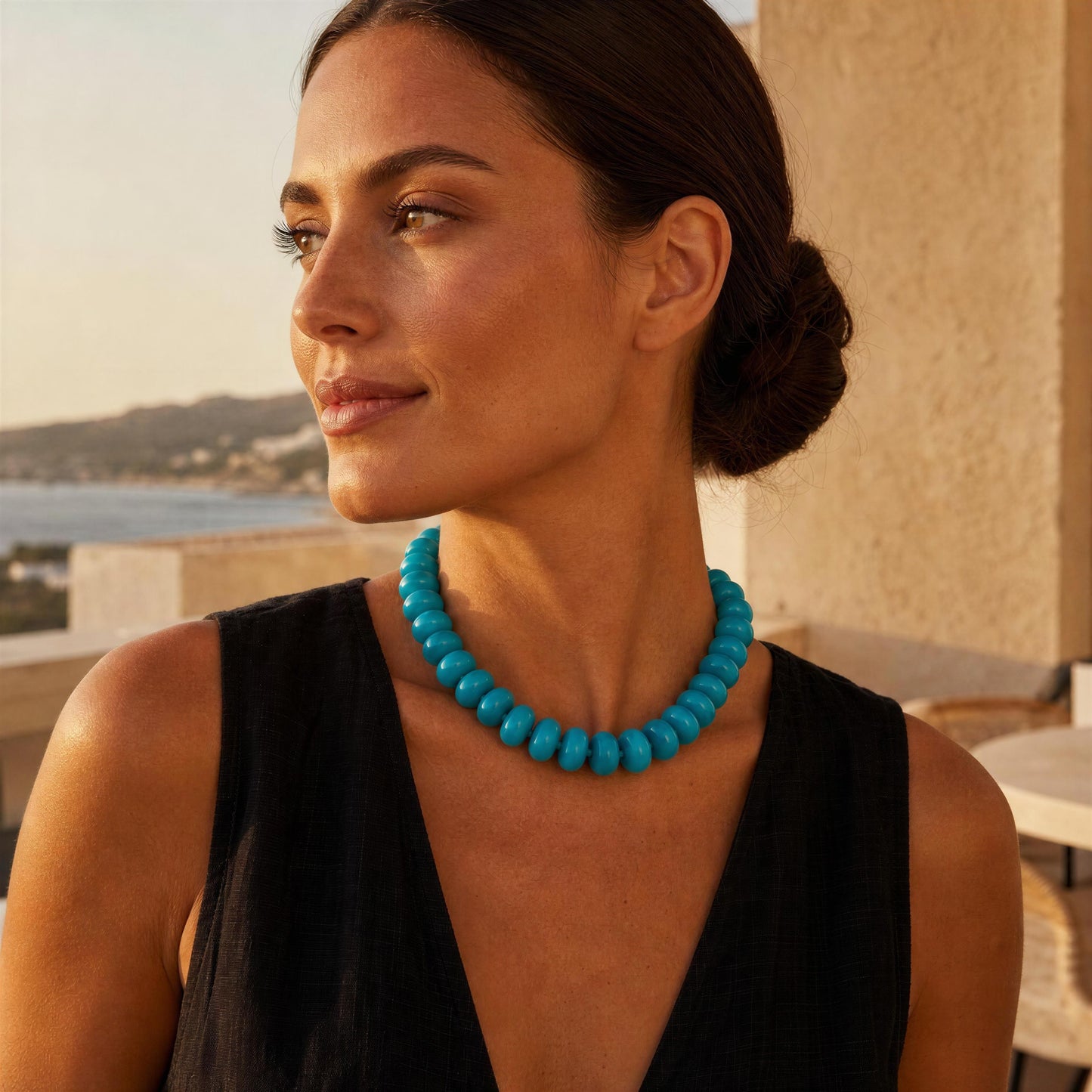 Woman wearing the Capri Turquoise Statement Choker with a scenic background