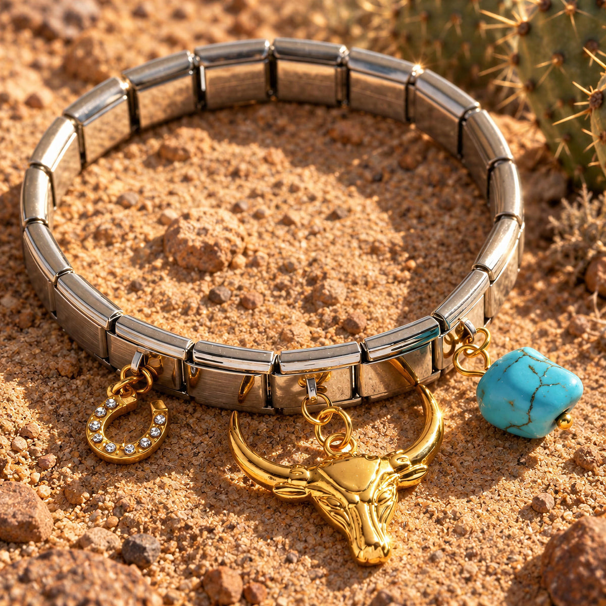 Desert Spirit mixed-metal Western charm bracelet with gold longhorn, horseshoe and turquoise-colored from Chica Chica Jewelry. 