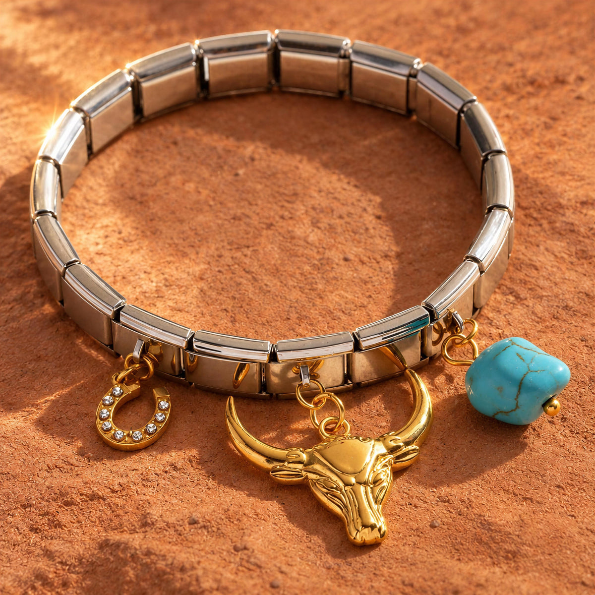 The Desert Spirit Bracelet from  Chica Chica Jewelry against Terracotta desert sand