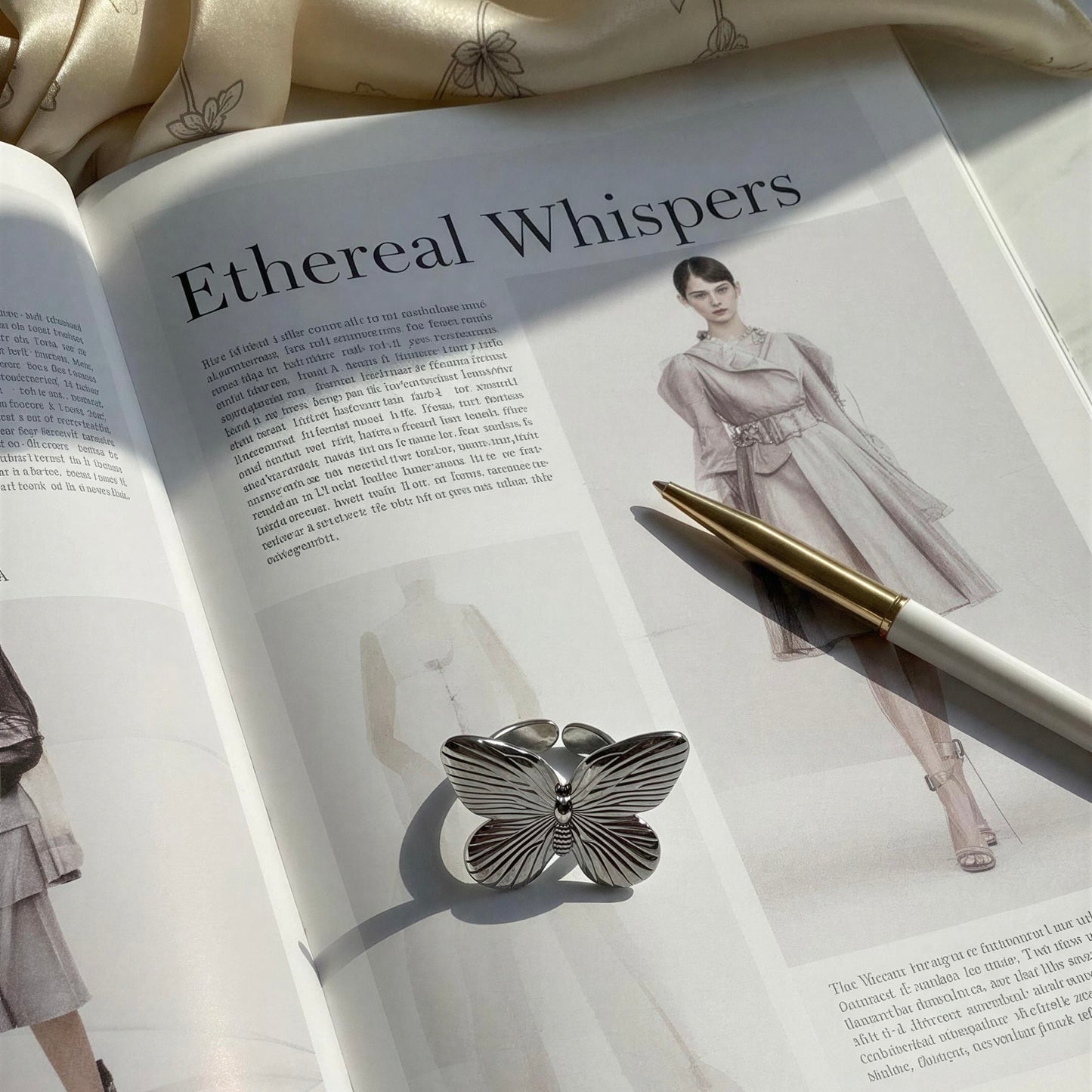 The Forever Flutter Ring in Silver on an open magazine with 'Ethereal Whispers' text