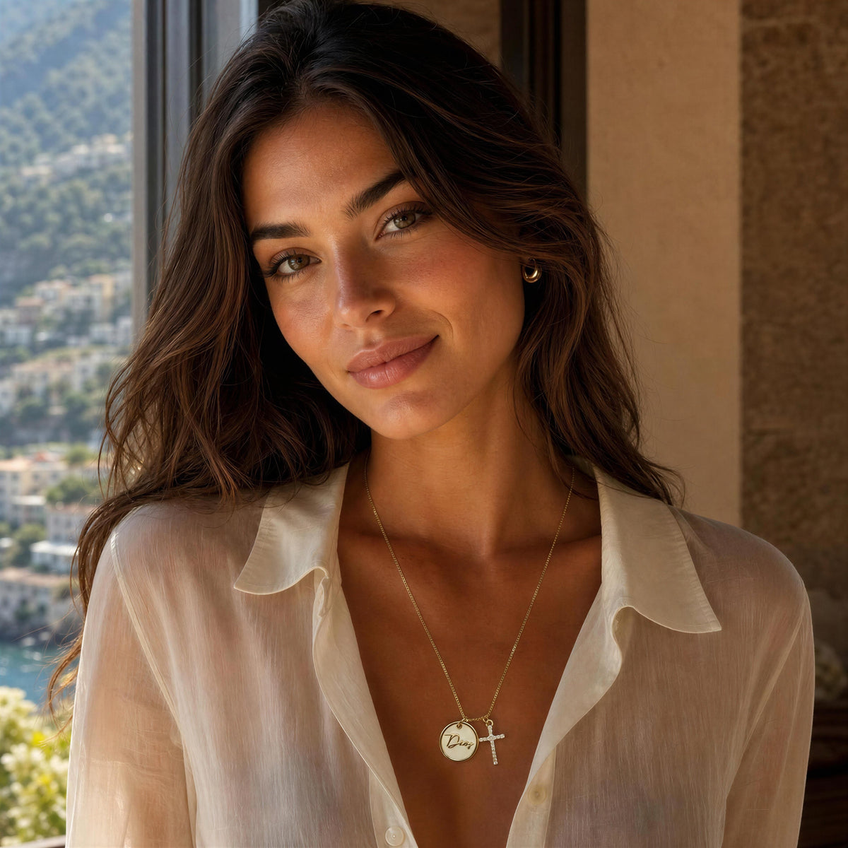 The Grazia Necklace
From Chica Chica Jewelry worn by model standing by a a Mediterranean window.